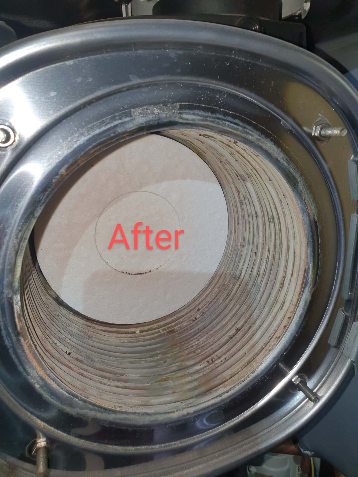 Clean boiler heat exchanger after full service by Swainson Gas Services